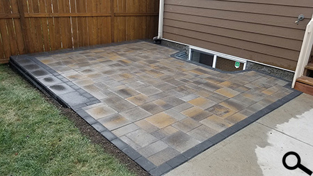 Brian Meyers Landscaping Stone Patio in Front of Window Well